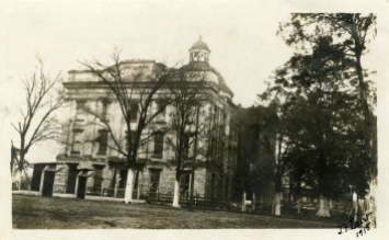 T.F. Laist, 1915. North side of Old Capitol Building, sign in front says "Danger Keep Out." MDAH Accession PI/STR/C36 /Box 20 Folder 95